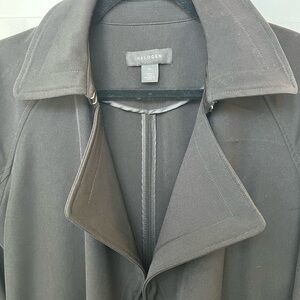 Pure black, pictures seem gray but it’s black. Lightweight trench style